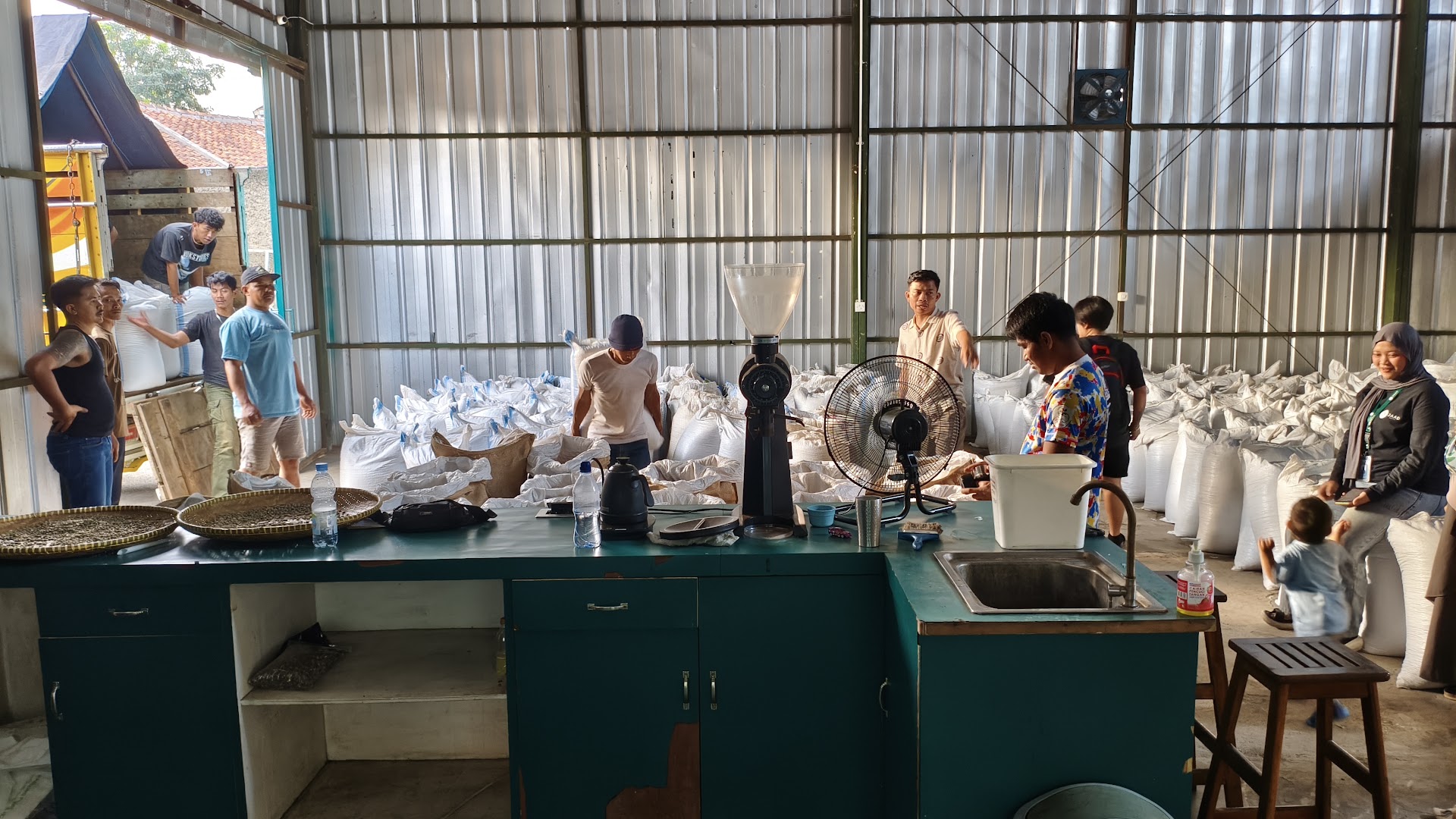 Jaad Food team grading and packing coffee beans
